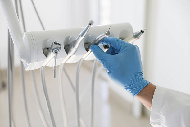 Professional Tooth Extraction technician working in Newton County County, MS